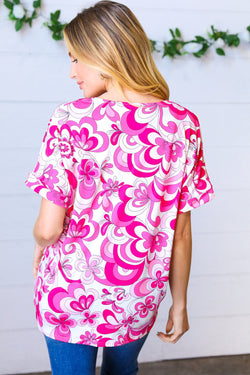 Magenta & White Geometric Floral V Neck Top