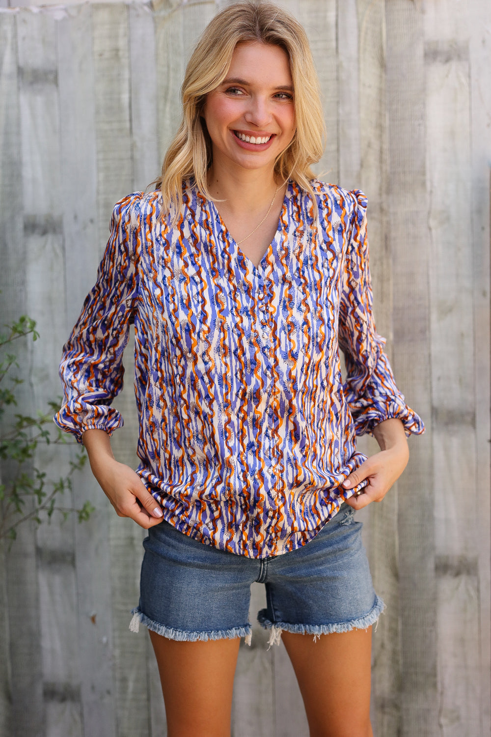 On A Wild Streak V Neck Fabric Button Detail Blouse