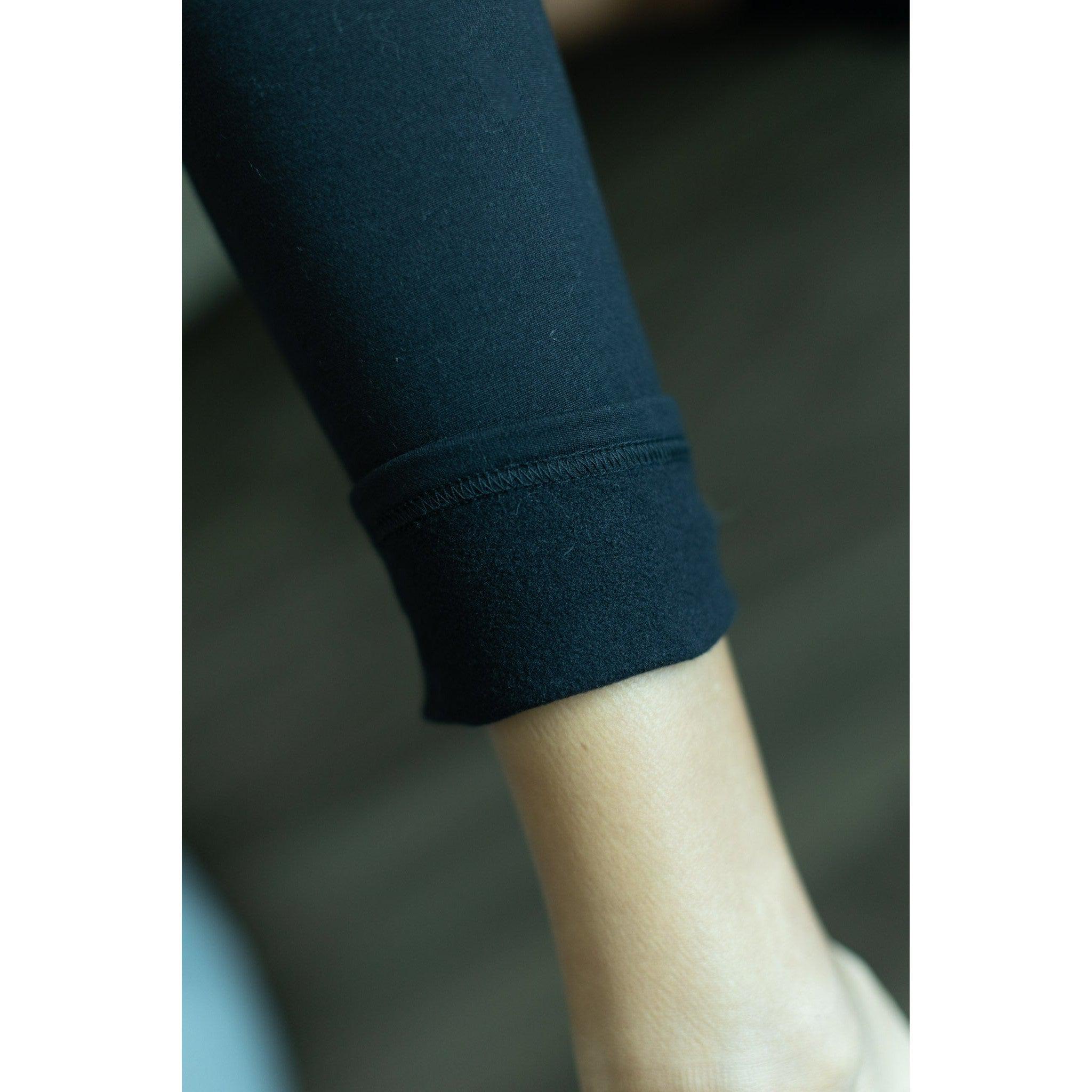 Julia Rose The Lilla black fleece full-length leggings with pockets, Women wearing black fleece-lined leggings with side pockets