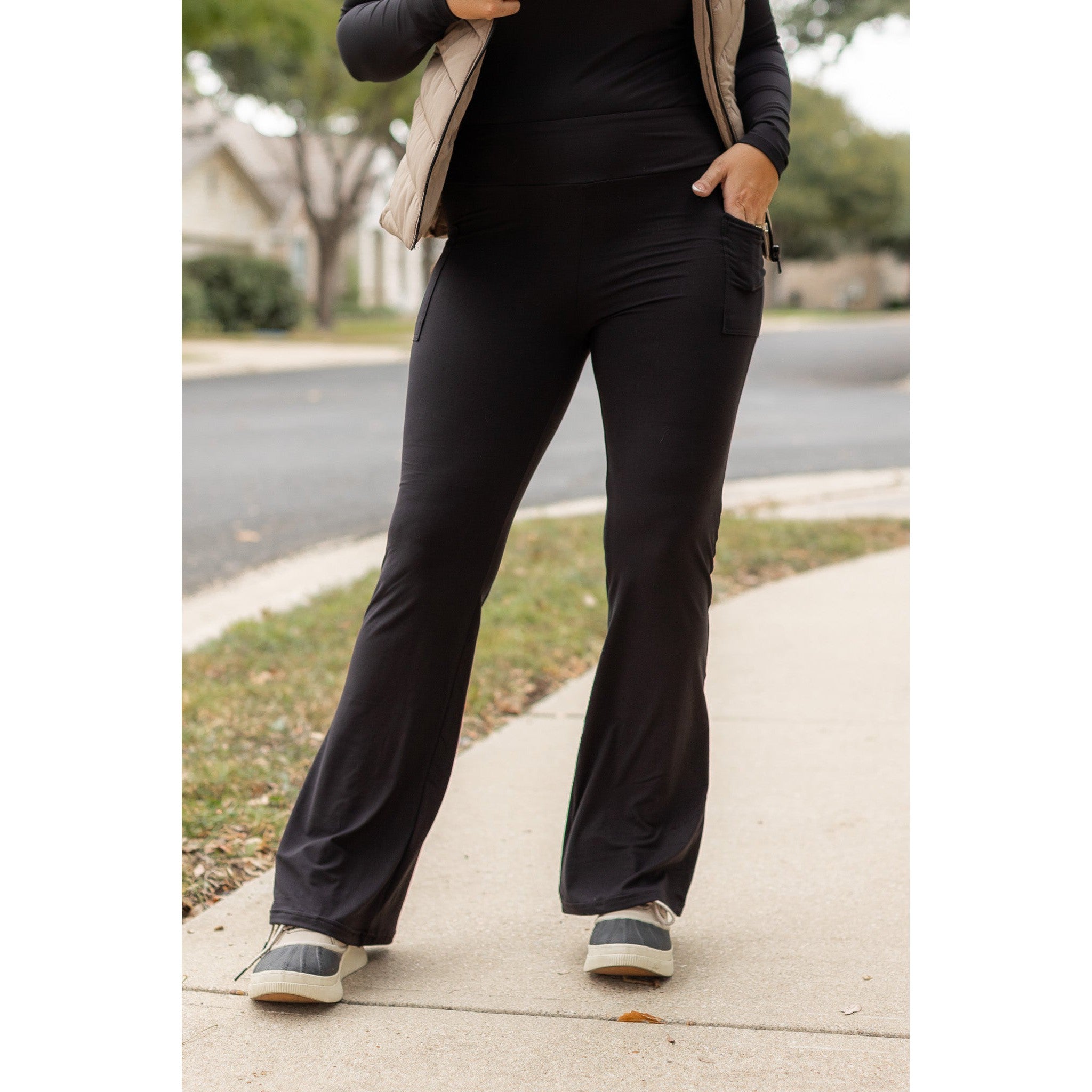 High-waisted black bootcut leggings by Julia Rose, Julia Rose women’s flared black leggings lifestyle image
