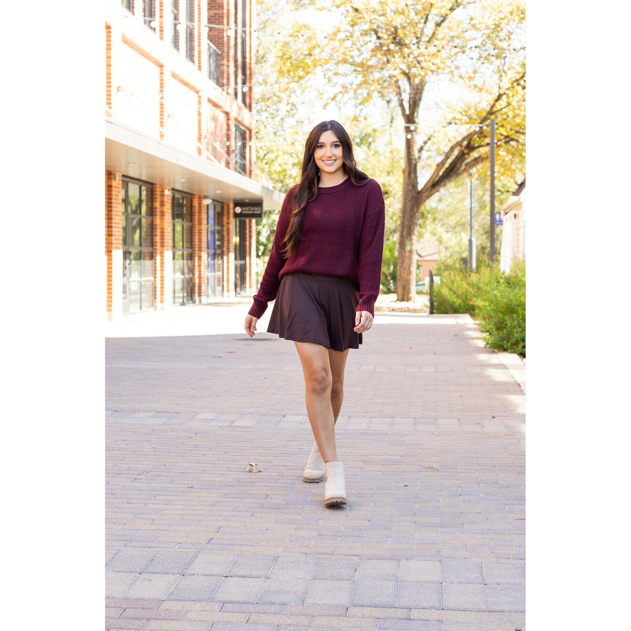 Stretchy brown Julia Rose skort styled for casual wear