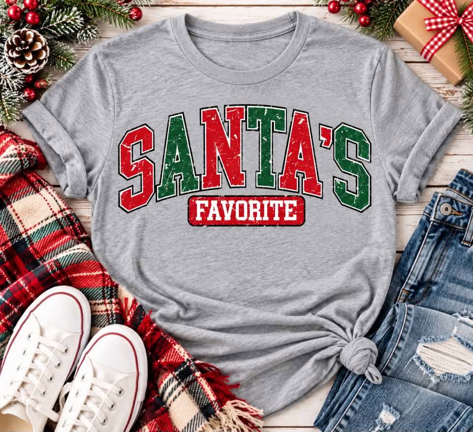 Grey Santa's Favorite Christmas short sleeve crewneck t-shirt with vintage distressed red and green varsity lettering, festive holiday graphic apparel.