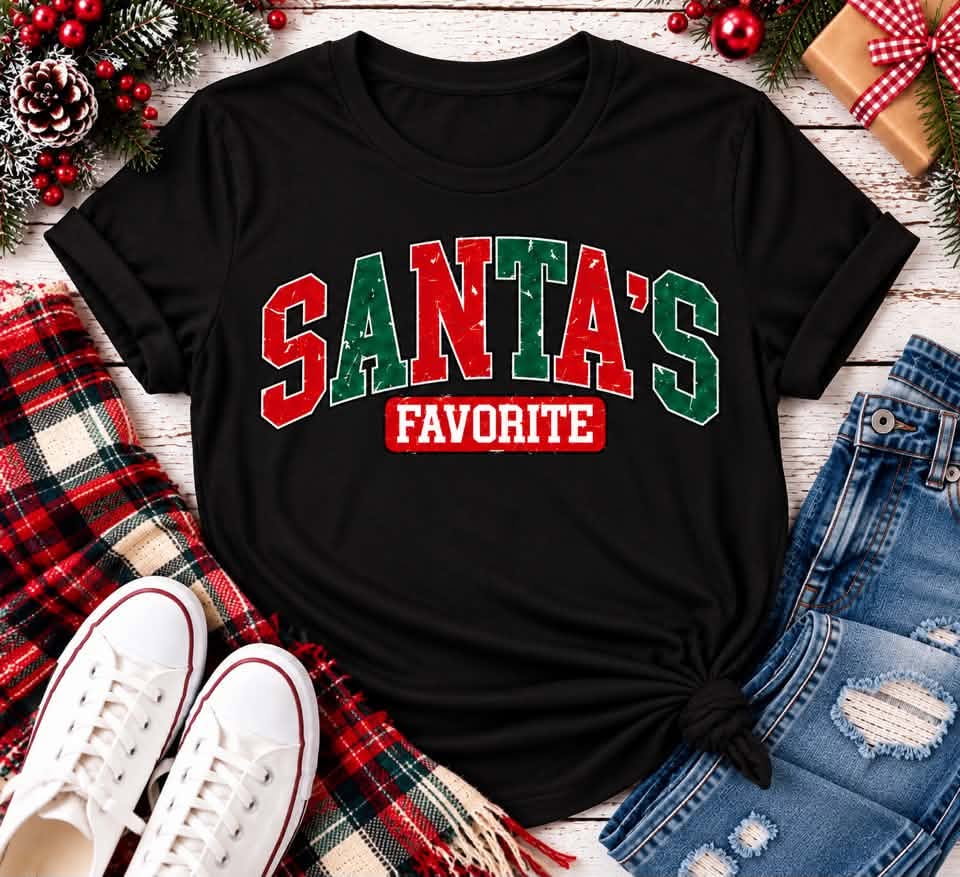 Black Santa's Favorite Christmas short sleeve crewneck t-shirt with vintage distressed red and green varsity lettering, festive holiday graphic apparel.