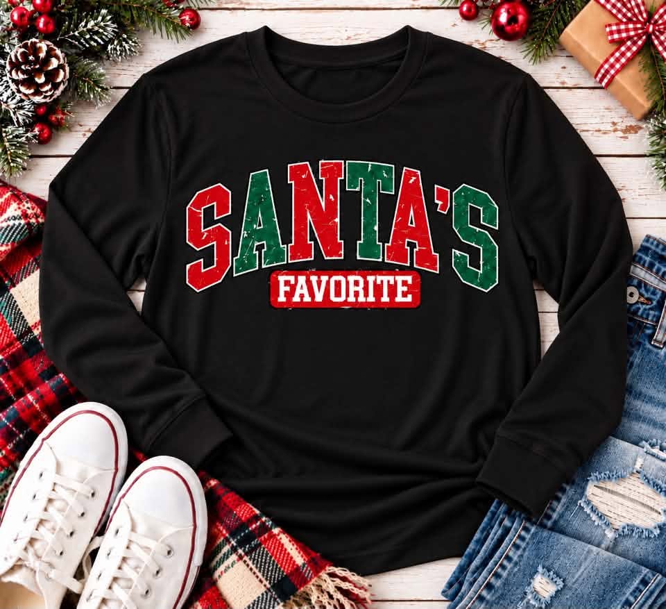 Black Santa's Favorite Christmas long sleeve crewneck shirt with vintage distressed red and green varsity lettering, festive holiday graphic apparel.