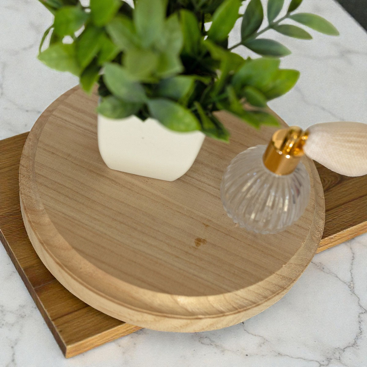 neutral wood centerpiece stand on marble countertop
rustic round wood tray with ball feet
natural wood riser for soap and lotion bottles
decorative round wooden stand for plants
farmhouse kitchen decor round wood pedestal