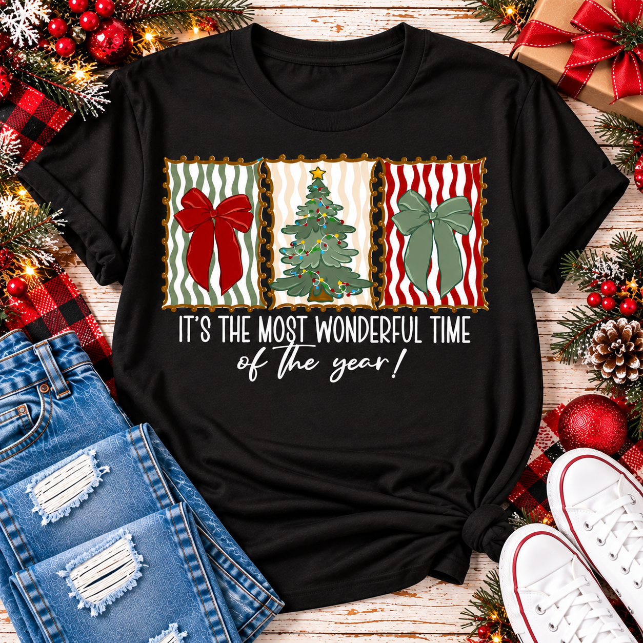 Black short sleeve Christmas graphic tee with red and green bows, decorated Christmas tree and Most Wonderful Time of the Year design.