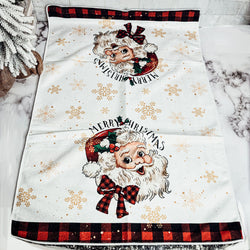 Christmas-themed kitchen towel with nostalgic Santa and holiday decor
Traditional holiday hand towel with Merry Christmas and snowflake design