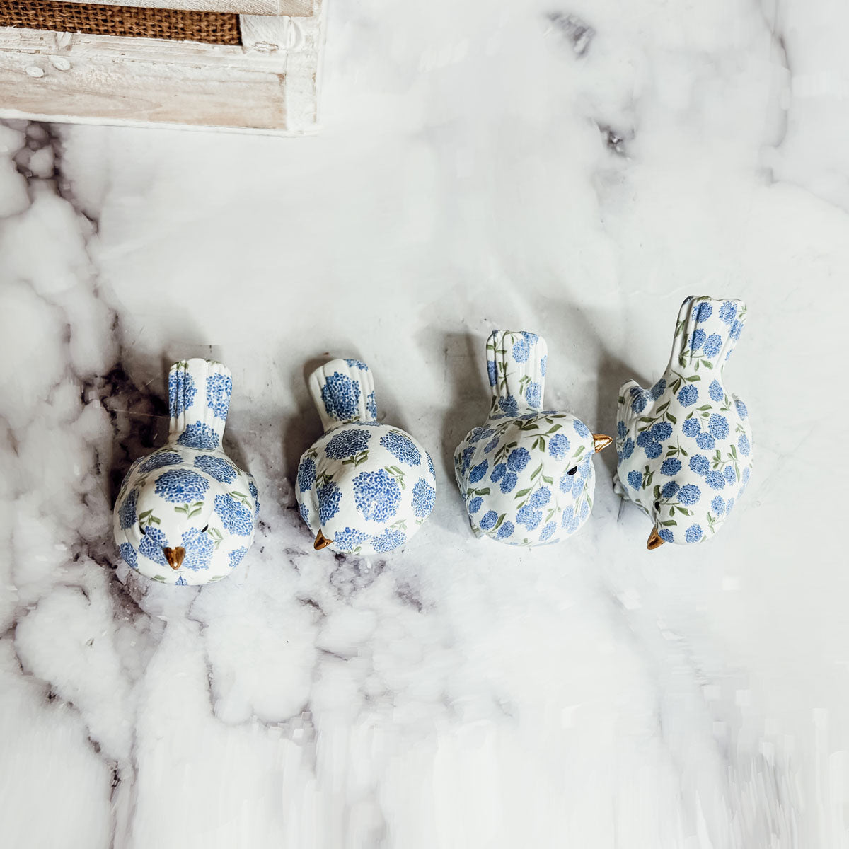 Gift-ready packaging of small resin blue hydrangea bird figurine, ideal for special occasions