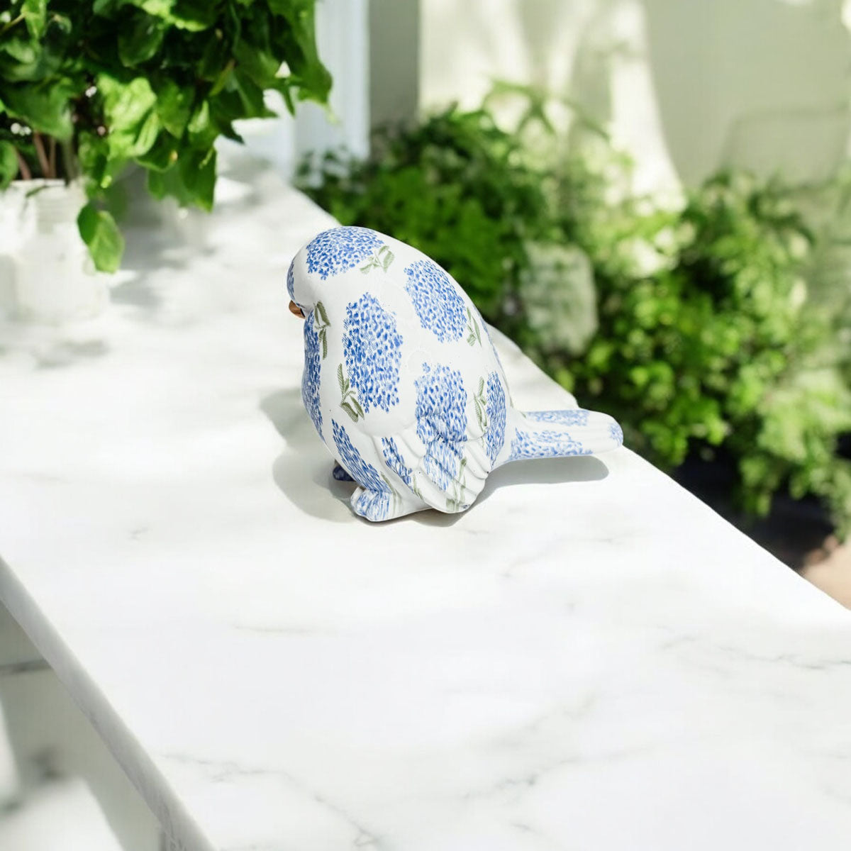 Charming bird lover gifts, including decorative figurines and wall art, ideal for adding a touch of nature to any space.