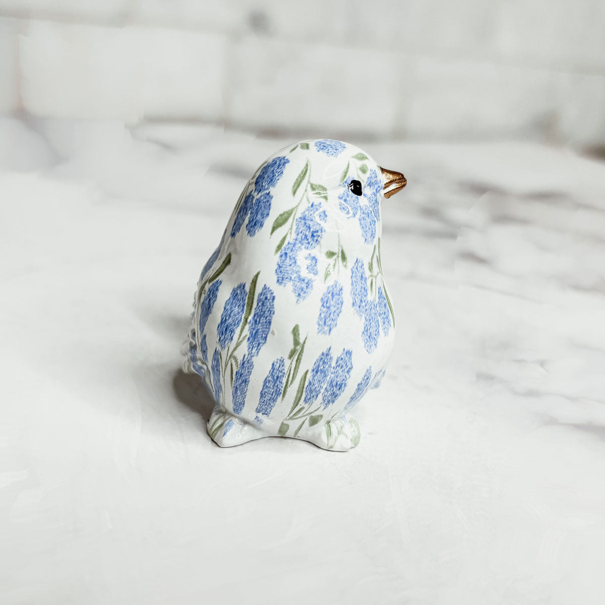 Unique bird lover gifts, featuring handcrafted bird sculptures and nature-inspired decor pieces