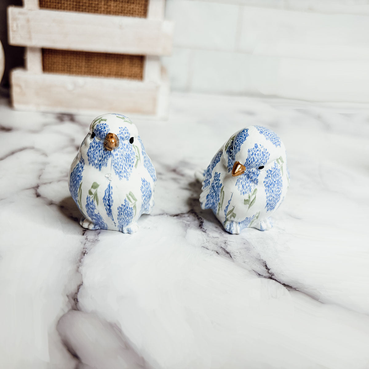 Stylish blue hydrangea bird figurines, a unique addition to your home decor collection