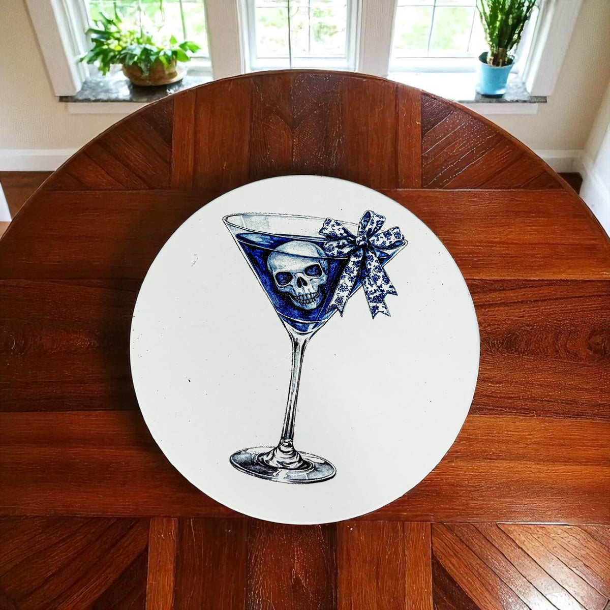 Blue chinoiserie skull martini cocktail coaster with cork backing on white surface
Elegant ghost design coaster in blue and white chinoiserie pattern
