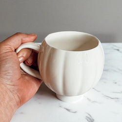 Autumn shopping pumpkin cups - October seasonal home decor accessories
Pre-Halloween pumpkin mugs - fall coffee accessories for seasonal preparation