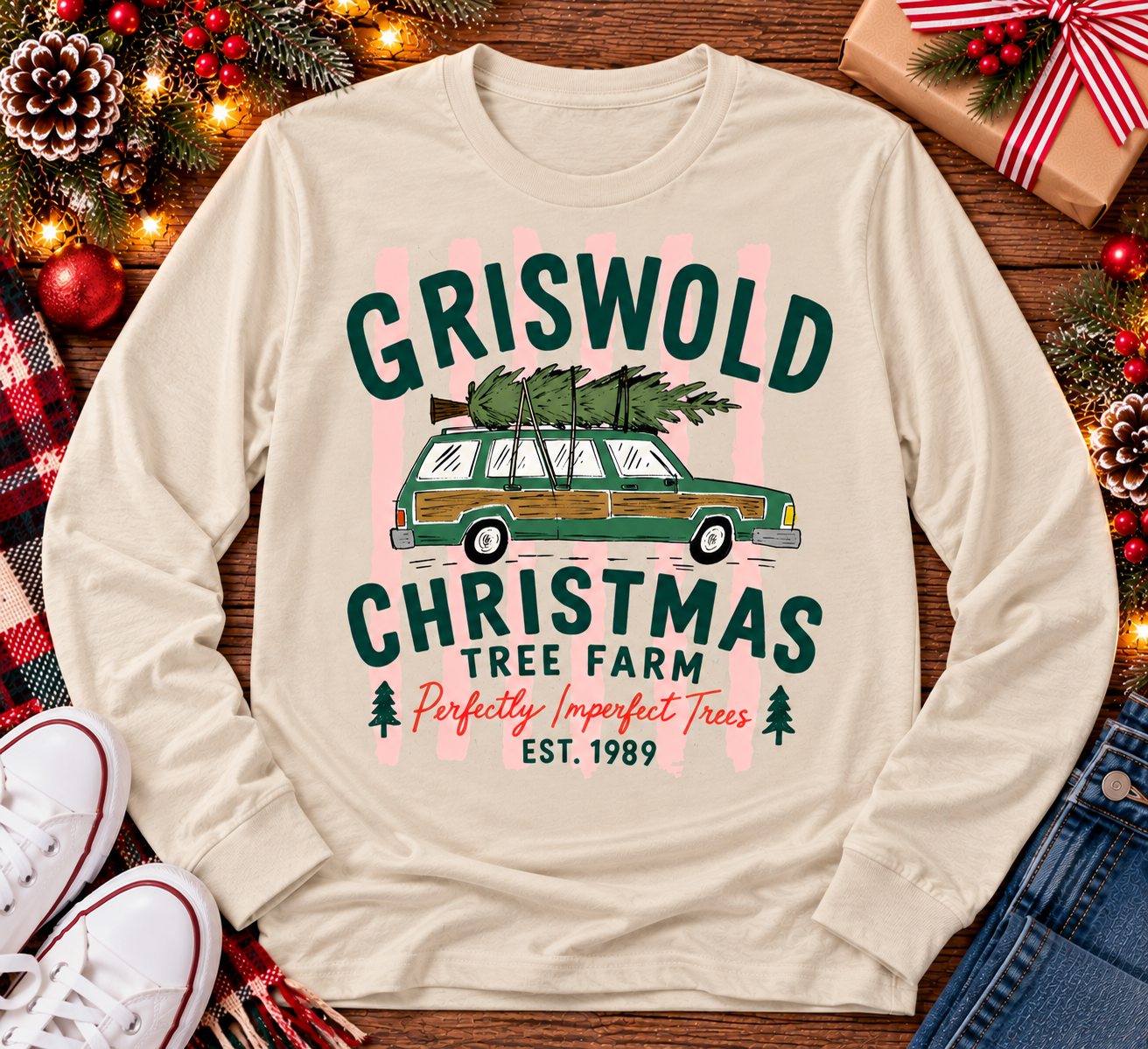 Christmas graphic tee featuring Griswold Christmas Tree Farm vintage green station wagon with Christmas tree and retro lettering.
