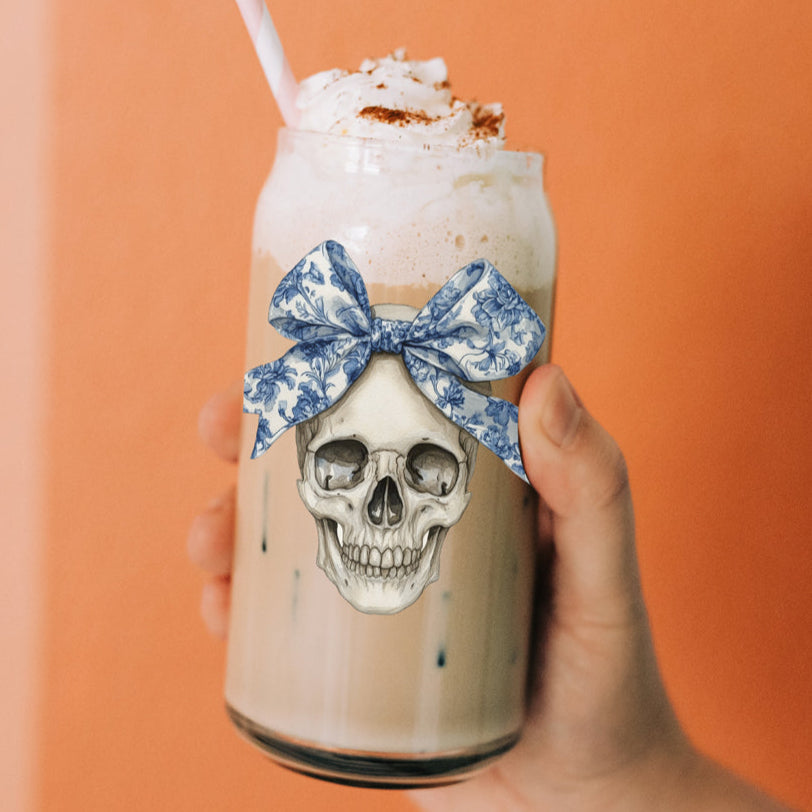 blue bow skull drinking glass
elegant halloween tumbler set
sophisticated spooky season glass