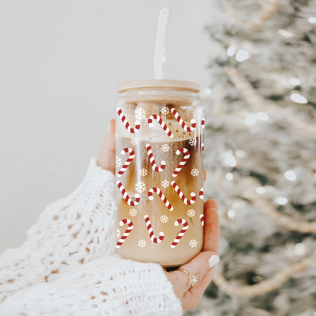 Christmas coffee tumbler – 17oz glass cup with candy cane and snowflake design
Holiday coffee mug – glass tumbler with bamboo lid and reusable straw