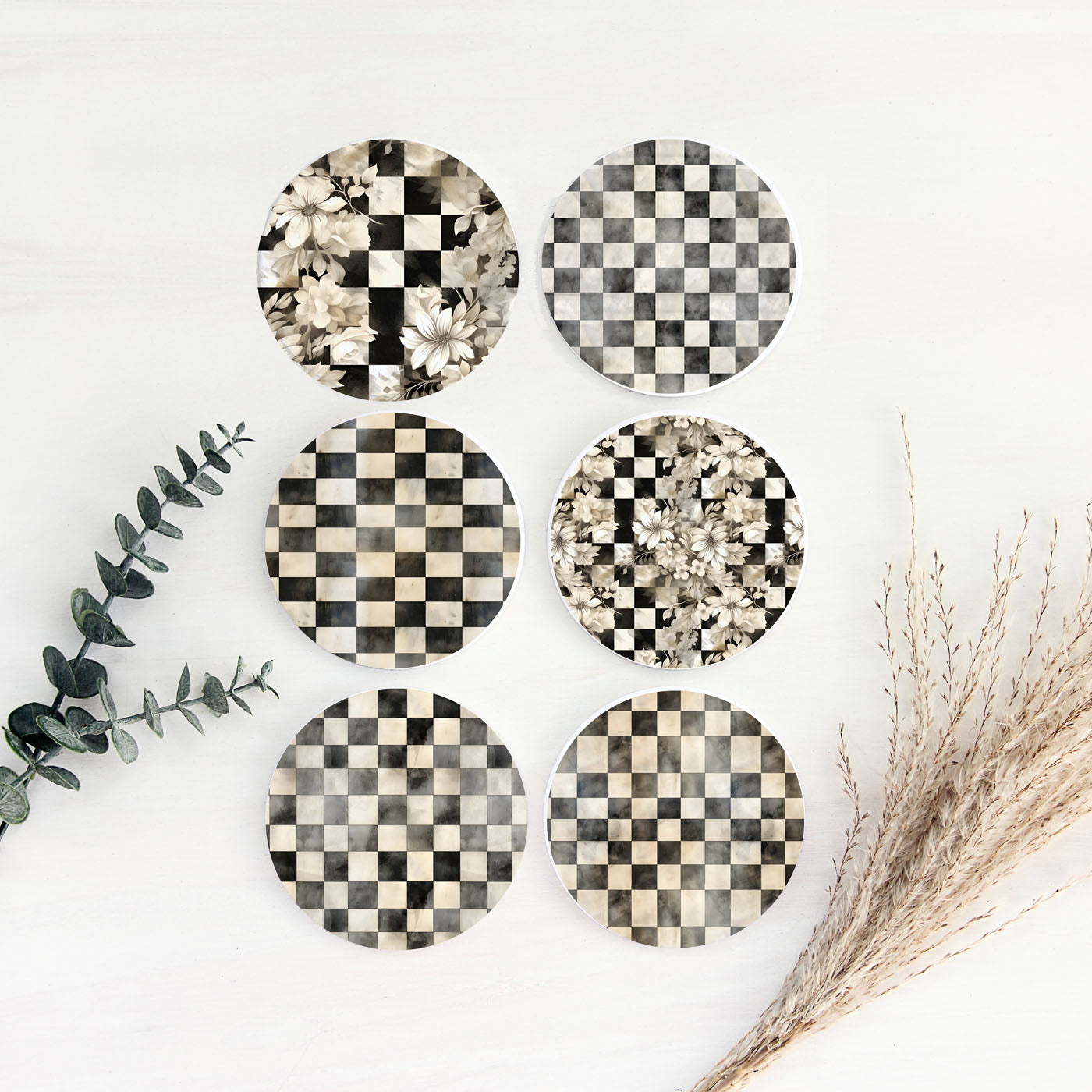 courtly check ceramic coasters with black and white pattern
Designer checkered coasters with vintage floral overlay and cork backing
Premium black and white check coasters for luxury home decor