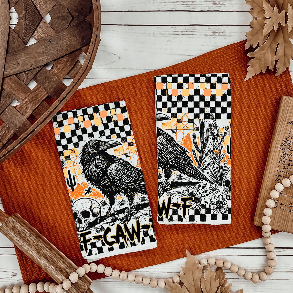 retro halloween kitchen textile with raven and skull print
vintage style funny crow towel for haunted kitchen décor
hilarious halloween décor towel for adults only crowd
unique spooky season gift crow and skull tea towel
funny fall home décor accent with raven print towel