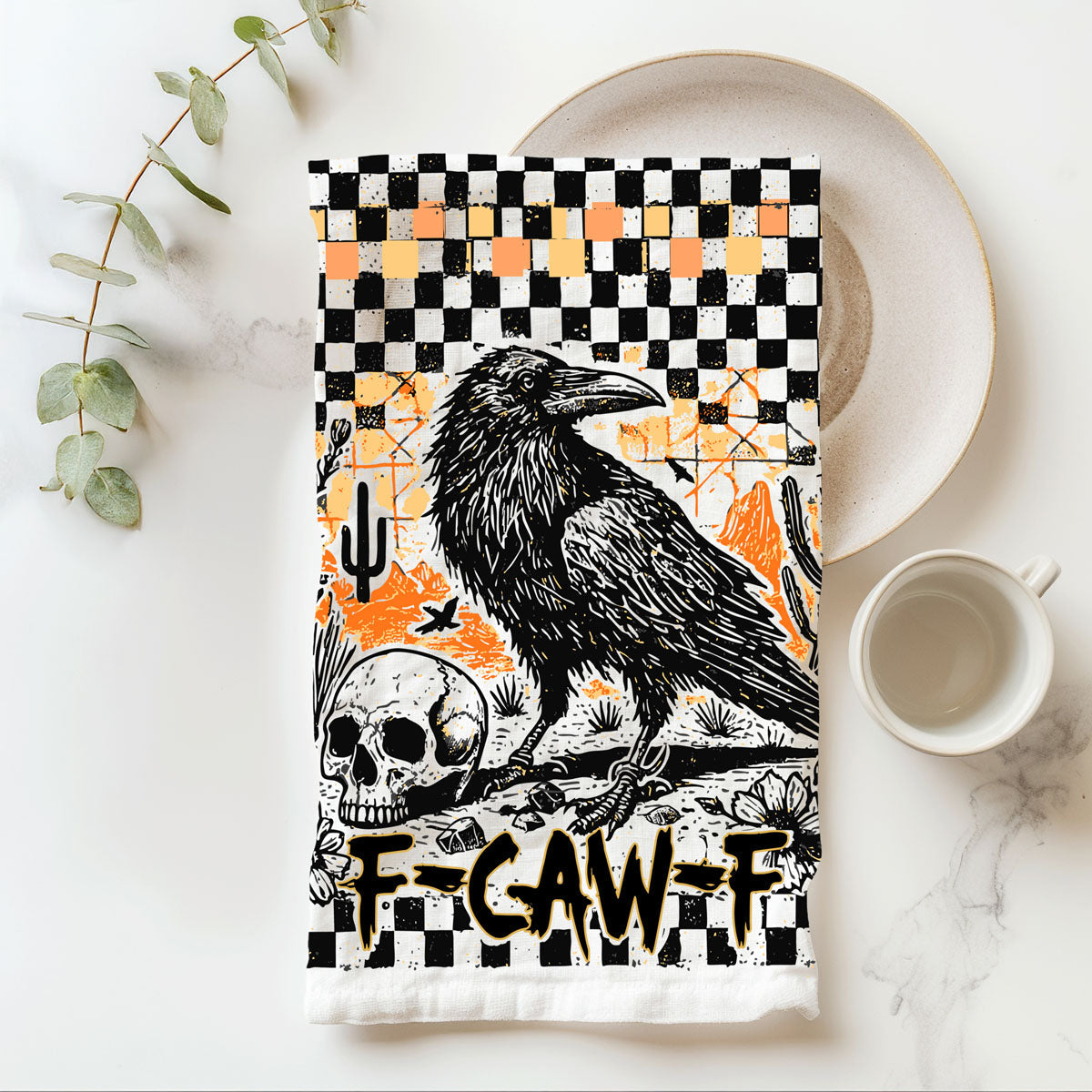 alternative halloween kitchen décor towel with raven graphic
dark humor halloween towel for gothic farmhouse kitchen
crow themed fall dish towel with orange accents
raven artwork tea towel with black and white checks
fall farmhouse halloween decor towel with raven and skull