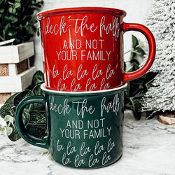 Deck the halls and not your family fa la la la Mugs