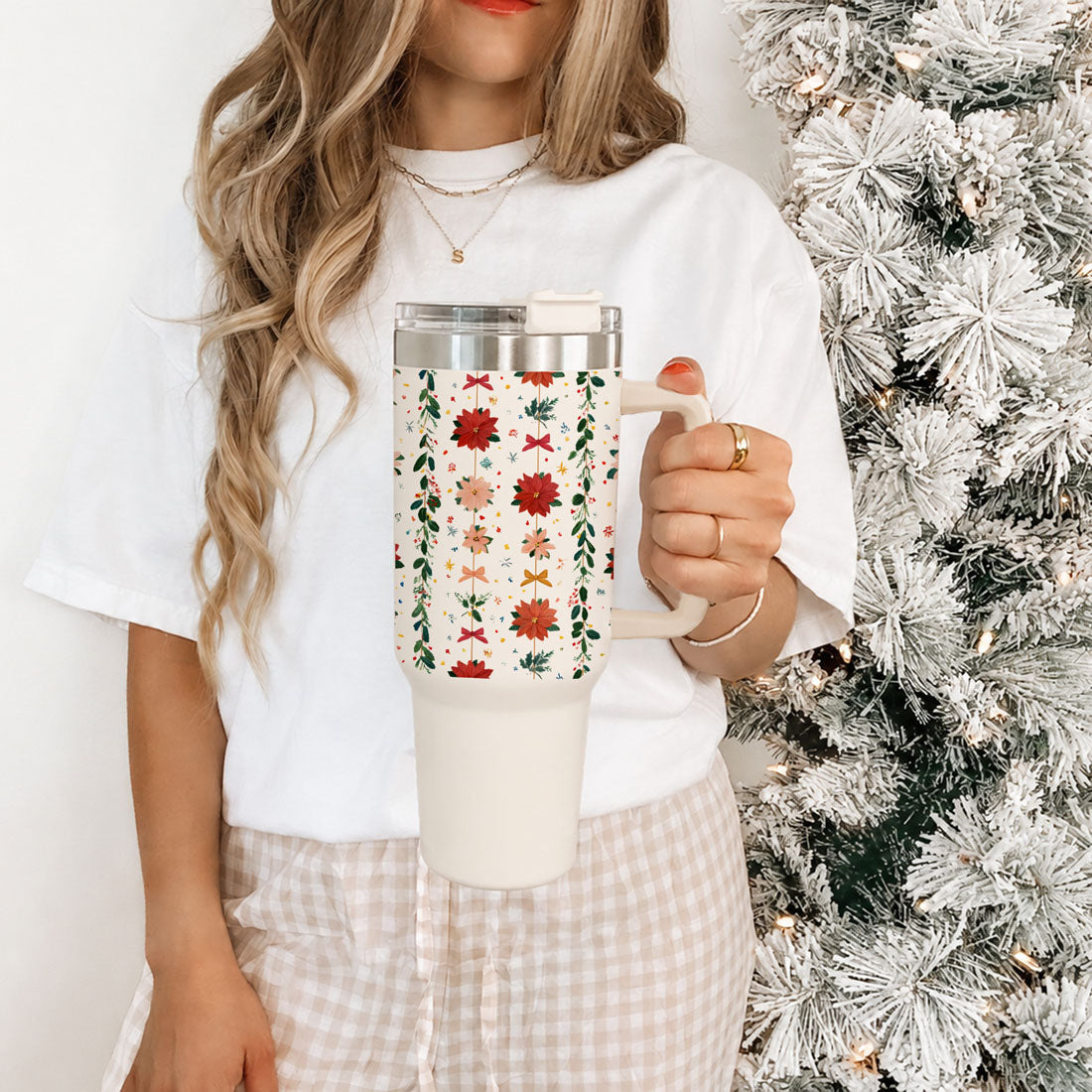 holiday floral artwork tumbler
floral Christmas lifestyle photography
botanical holiday lifestyle image
poinsettia Christmas tumbler lifestyle photo
woman holding floral Christmas tumbler
woman holding botanical holiday tumbler
floral Christmas tumbler in cozy living room
poinsettia tumbler beside Christmas tree
botanical Christmas tumbler with wreath background
floral Christmas tumbler styled with holiday greenery
holiday flower tumbler in festive home
pink floral Christmas tumbler in cozy decor