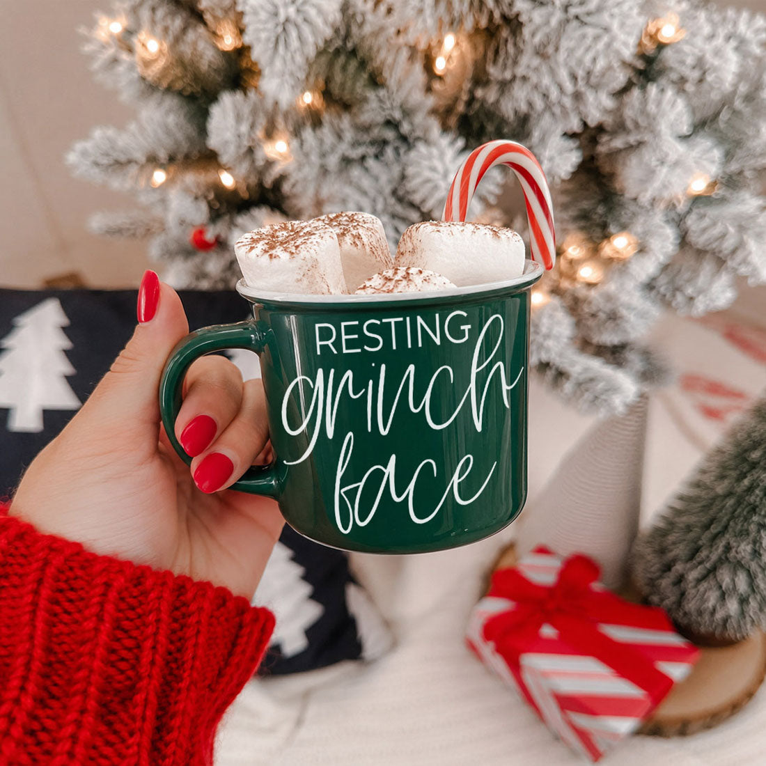funny Christmas character mug
grinch themed holiday gift
Christmas movie inspired mug
holiday movie night coffee cup
funny Christmas movie mug
Christmas villain humor mug
grinch vibes coffee mug
green resting grinch face mug filled with marshmallows
Christmas mug with whipped cream and candy cane