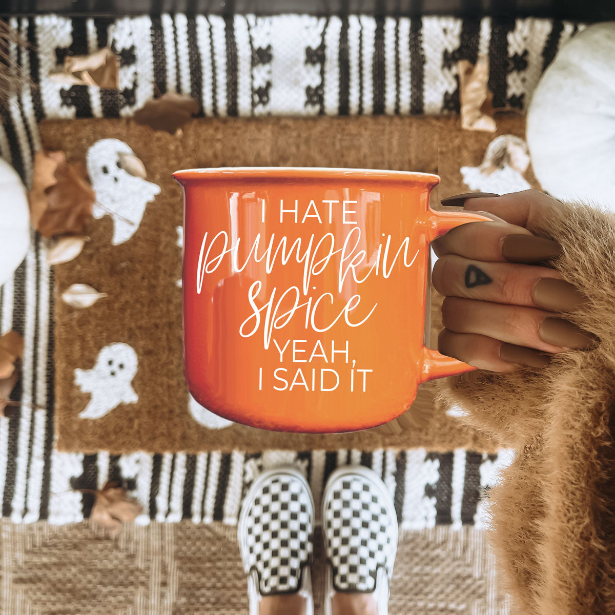 funny autumn mug perfect for group photos
bright orange coffee cup with strong fall opinion
novelty fall drinkware for adults
autumn mug for people who like classic coffee
funny fall coffee mug gift for sarcastic sister
orange autumn mug wrapped in knit scarf
cozy campfire scene with bright orange coffee cup