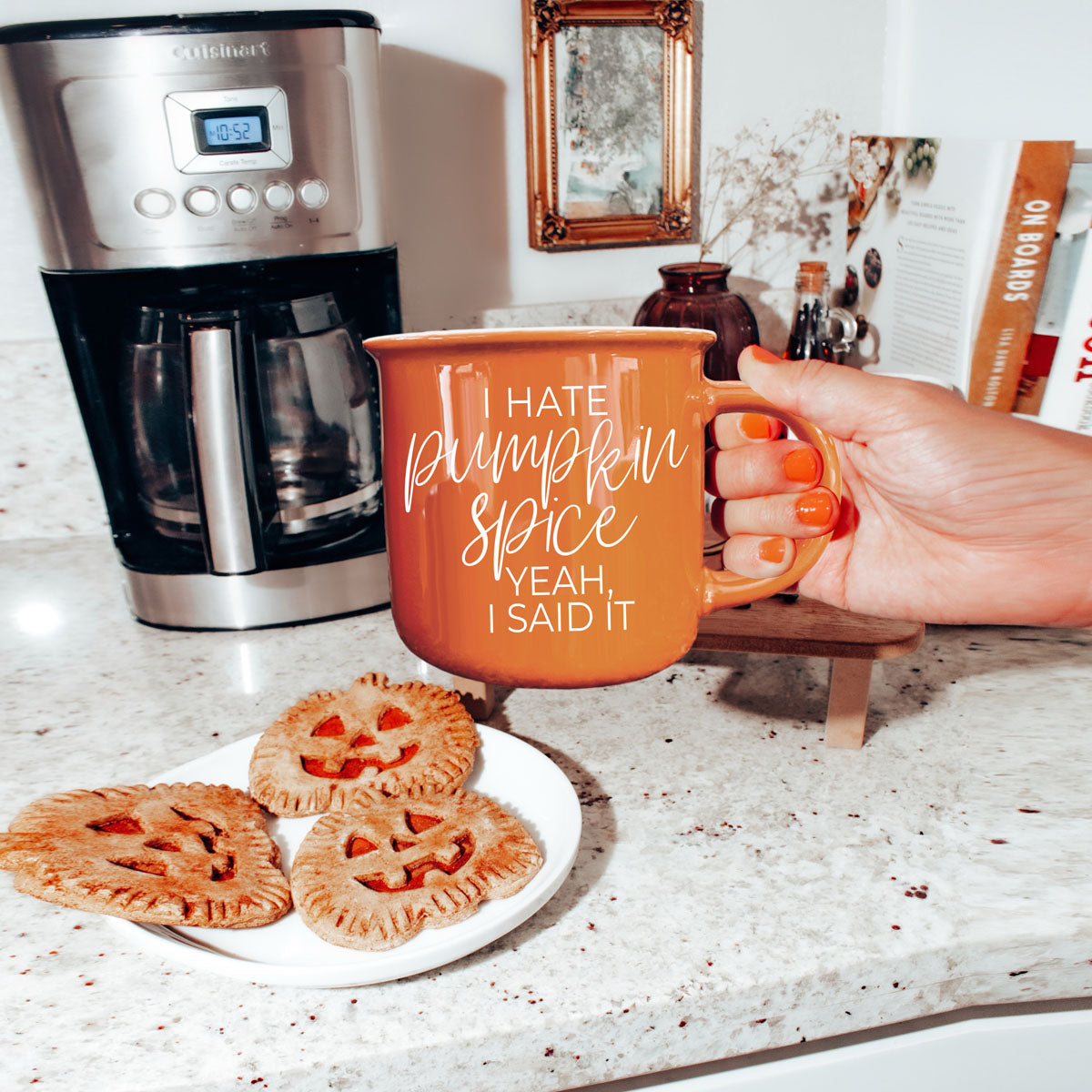 non pumpkin spice fall coffee mug
funny autumn drinkware for coffee lovers
orange mug for fall decor and halloween season
sarcastic fall coffee mug for women
funny seasonal mug with minimalist fall styling
orange mug with fall candle and mini pumpkins
cozy living room setup with sarcastic fall mug
autumn breakfast table with coffee and orange mug