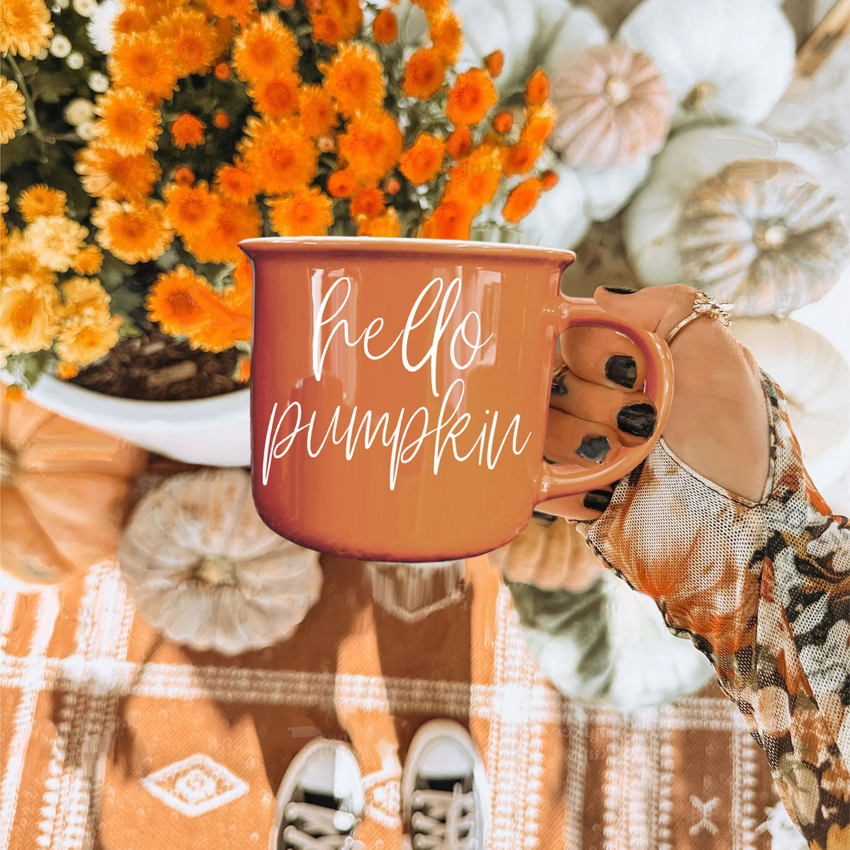 fall coffee bar styling with orange mug
orange ceramic mug in farmhouse kitchen
autumn drinkware on rustic cutting board
pumpkin spice station with orange mug