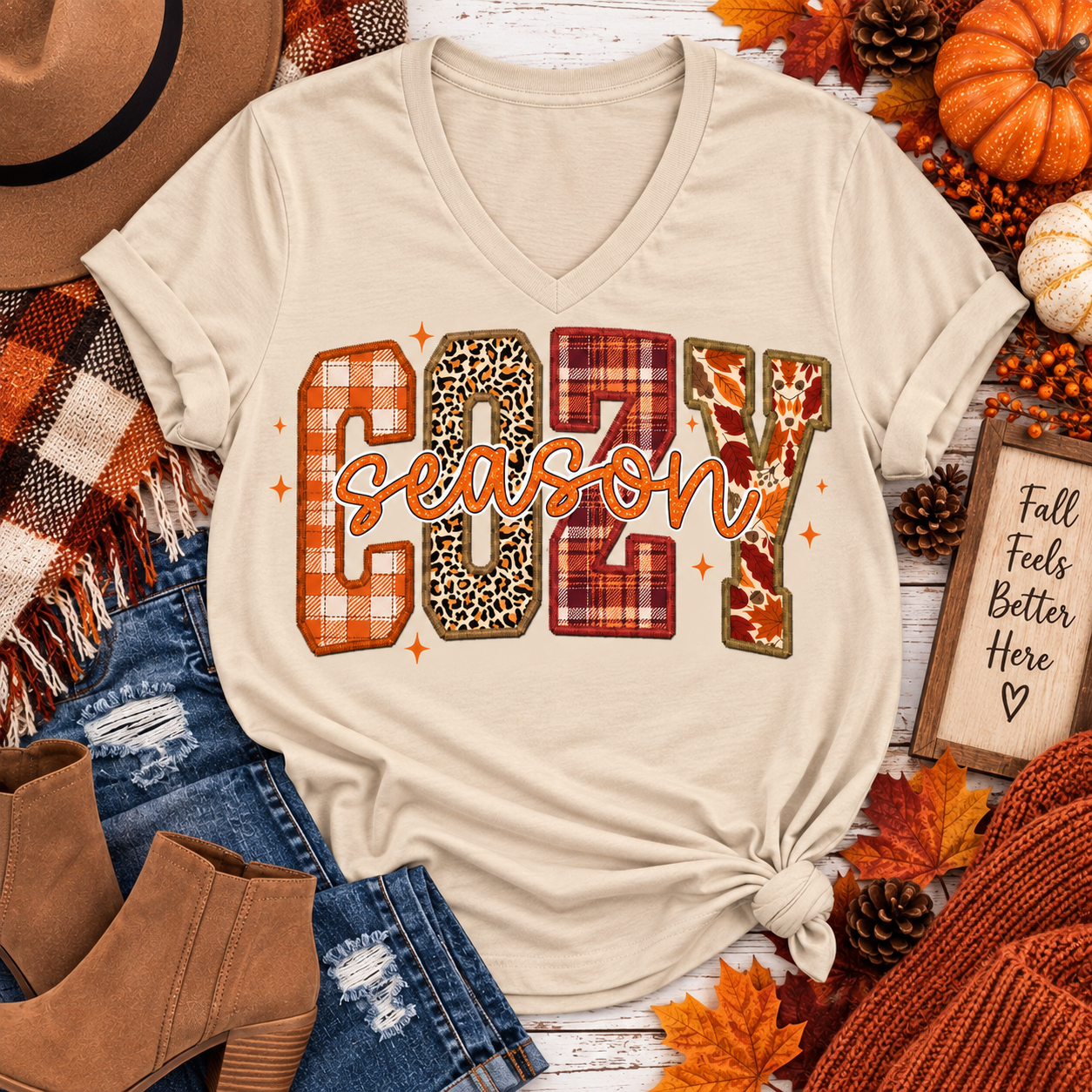 Cream V-neck Cozy Season fall graphic tee featuring plaid, leopard and leaf print design