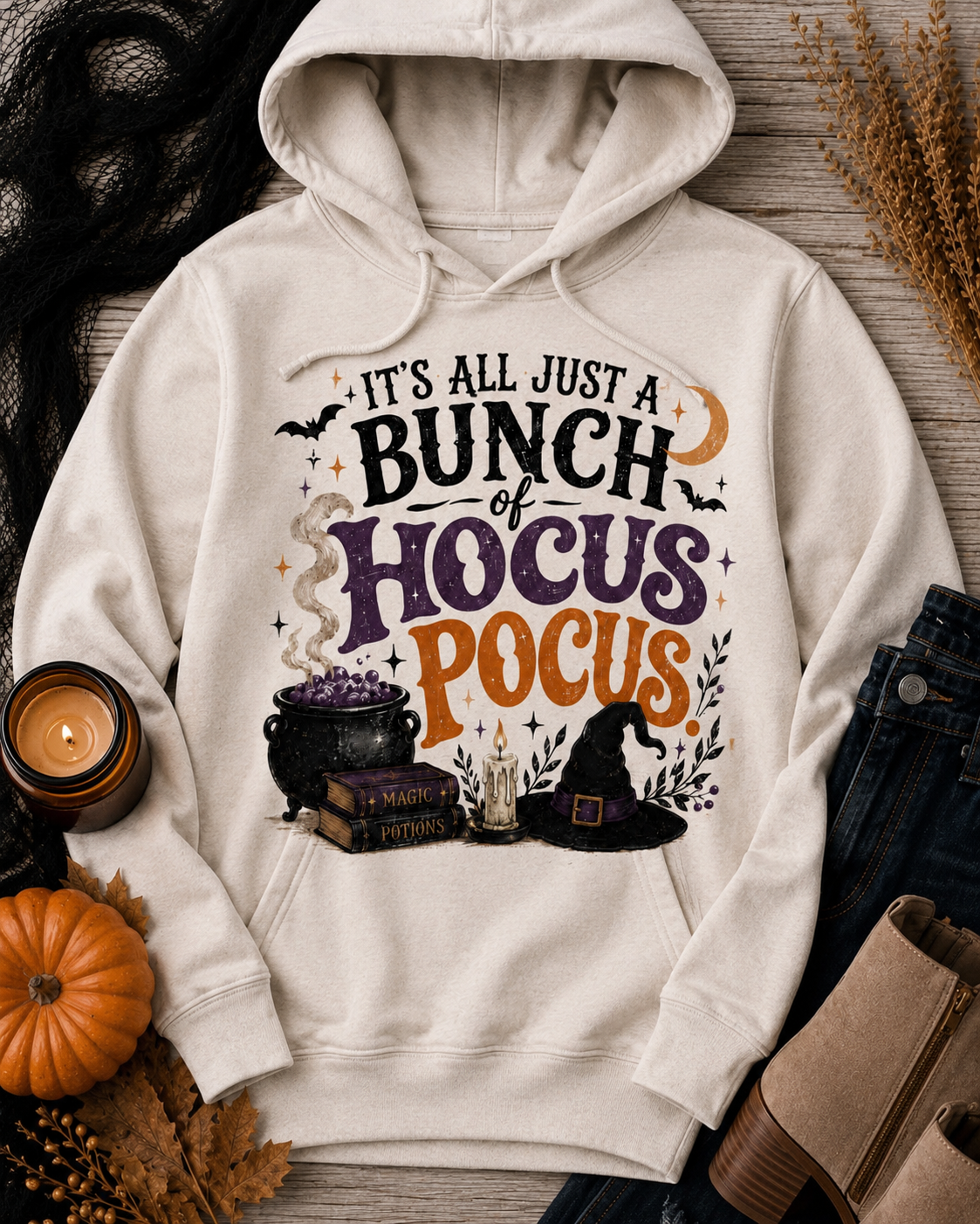 Hocus Pocus Halloween graphic hoodie featuring witch hat, cauldron, bats and spell books