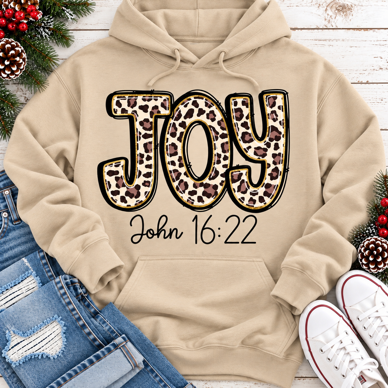 JOY John 16:22 leopard print Christmas graphic apparel available in four styles and two colors.