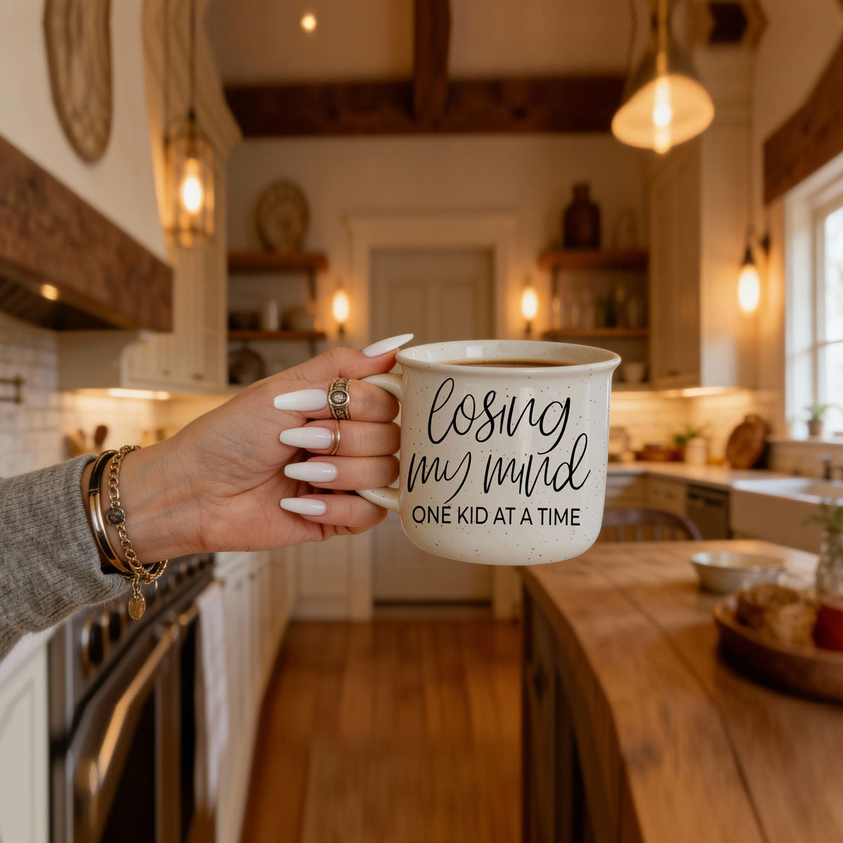 mug for moms who say they’re fine but losing it
trendy neutral mom mug with playful parenting quote
losing my mind one kid at a time mug on cozy sweatshirt backdrop
funny multi kid mom coffee mug
overwhelmed mom humor ceramic mug
coffee mug for mom surviving motherhood