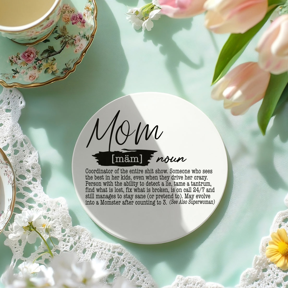 Funny ceramic coasters in modern home setting
Mom life coasters for coffee table decor
Humorous definition coasters for entertaining
Parent life ceramic coasters collection display