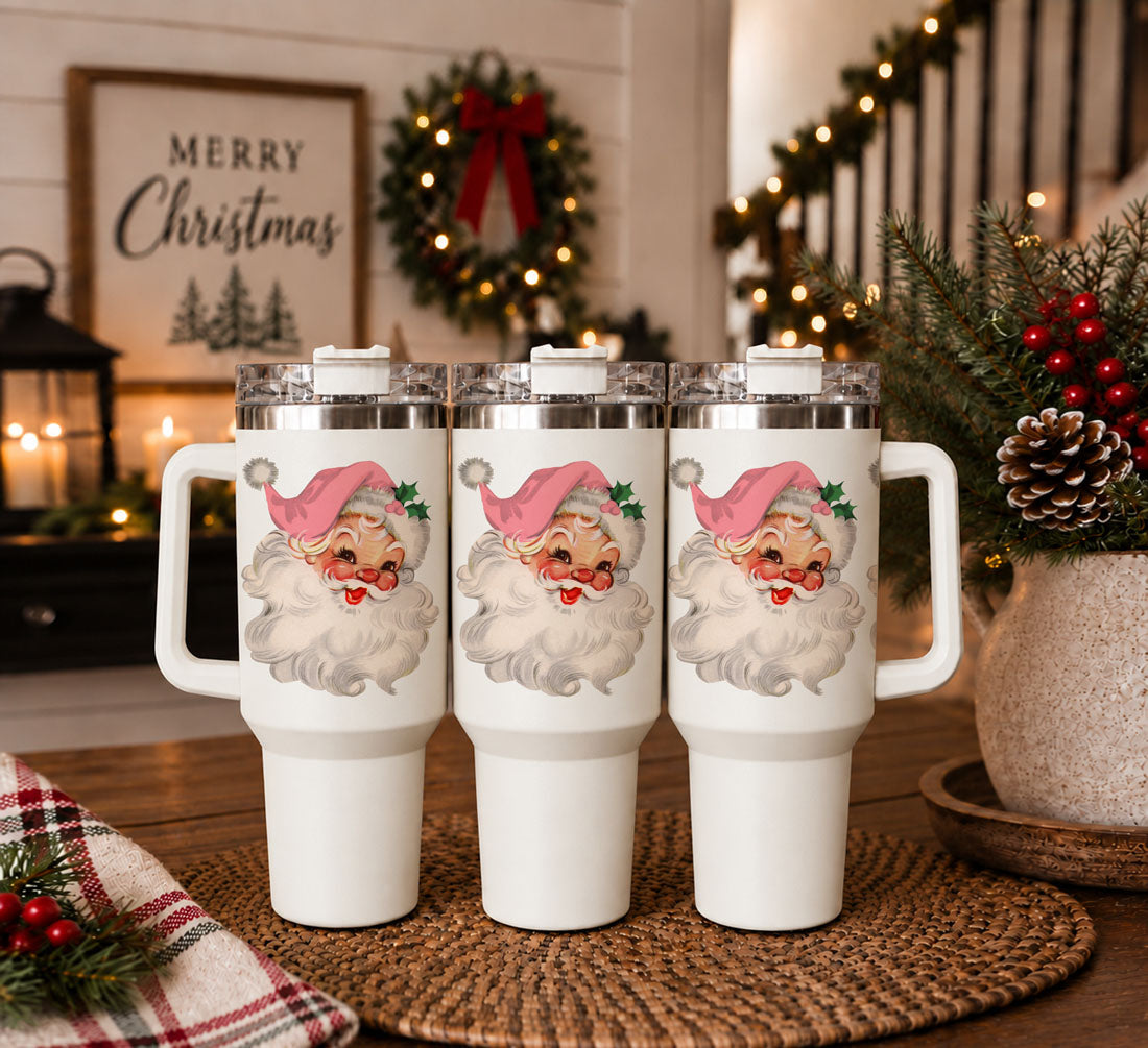 vintage Santa graphic Christmas drinkware
retro pink Santa print tumbler
festive Santa artwork on white tumbler
Christmas tumbler with nostalgic Santa graphic
pink Santa holiday design closeup
retro Santa Claus face travel cup
vintage Santa illustration on handled tumbler
pink hat Santa Christmas cup detail
Santa face holiday tumbler product
retro holiday Santa design on travel cup
vintage Santa Christmas artwork drinkware
cheerful Santa Claus face tumbler
rosy cheek vintage Santa drink cup
Christmas Santa 