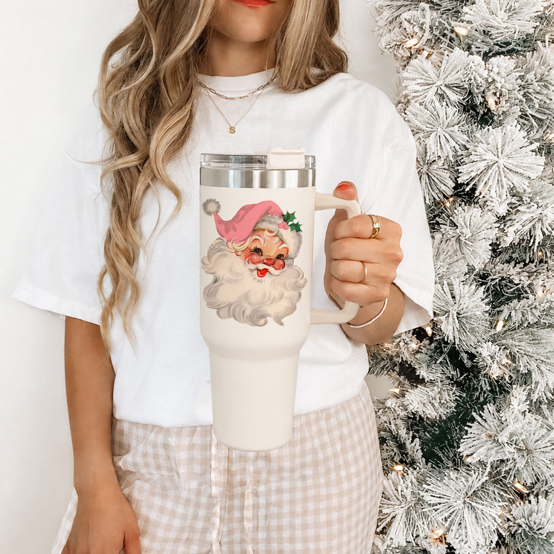 holiday water tumbler with Santa design
festive travel cup with vintage Santa
large Santa Christmas drink cup
40 ounce Santa holiday drinkware
Christmas tumbler with large side handle
handled Santa Claus holiday tumbler
Christmas cup with lid and retro Santa
reusable vintage Santa travel cup
holiday beverage tumbler with Santa artwork
festive Santa water cup for winter
retro Santa coffee tumbler for December
Christmas morning Santa coffee cup
holiday season pink Santa tumbler
cozy winter Santa drinkware
