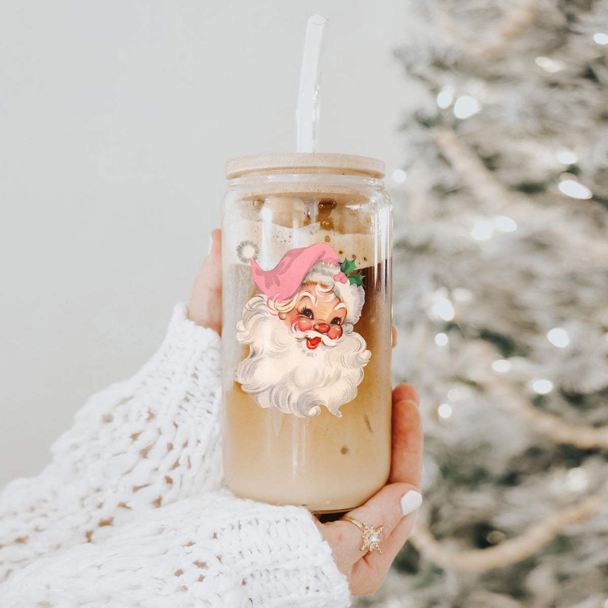 Retro holiday tumbler - festive Santa face pink hat design glass
Reusable Christmas tumbler - vintage Santa glass with bamboo lid and straw