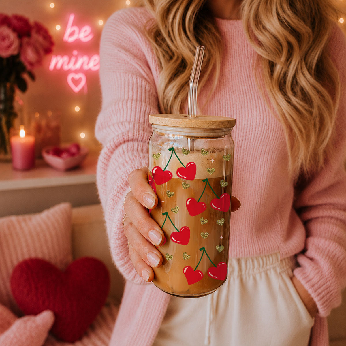 Wholesale 20oz glass cups with bamboo lid and glass straw featuring Self Love Club design, red heart, and cherry graphics.
Self Love Club 20oz glass cups with bamboo lid, glass straw, and gold glitter hearts for an empowering Valentine’s gift.
