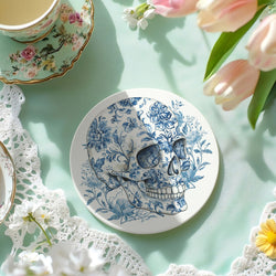 Blue chinoiserie skull martini cocktail coaster with cork backing on white surface
Elegant ghost design coaster in blue and white chinoiserie pattern
Gothic bat coaster featuring blue willow style illustration on ceramic
Floral skull coaster in blue and white chinoiserie pattern with cork backing