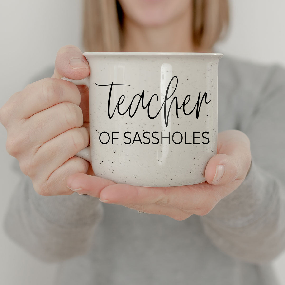 “Teacher of Sassholes” 14oz ceramic coffee mug—perfect funny gift for teachers. Double-sided design, microwave & dishwasher safe. Ideal for teacher appreciation, birthdays, and classroom laughs!