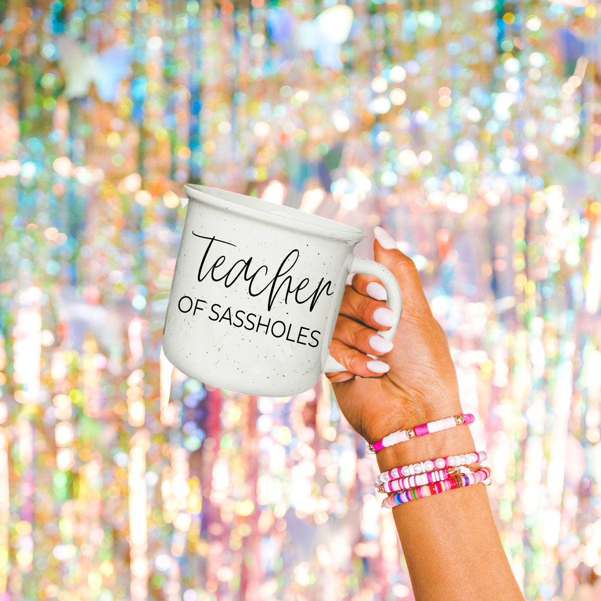 sarcastic coffee cup for exhausted teacher
teacher of sassholes mug for preschool teacher
funny mug for daycare teacher appreciation
large capacity teacher coffee mug 14oz
teacher of sassholes mug lifestyle photo
teacher of sassholes cup for teacher birthday gift