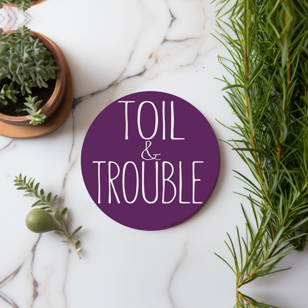 Drink Up Witches purple ceramic coaster for Halloween parties
Bewitched purple Halloween coaster with cork protection
Toil & Trouble witch themed coaster in elegant purple