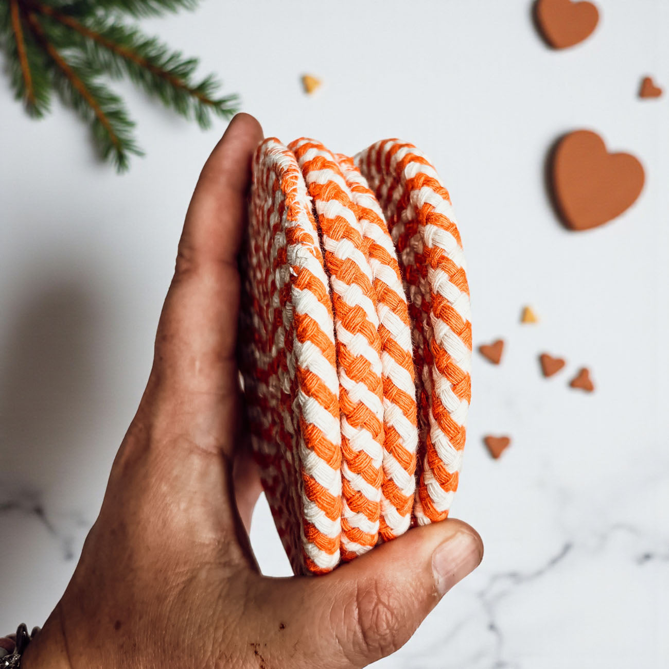 orange and white braided rope coasters cozy fall table decor
burnt rust rope coasters warm autumn coffee table accent