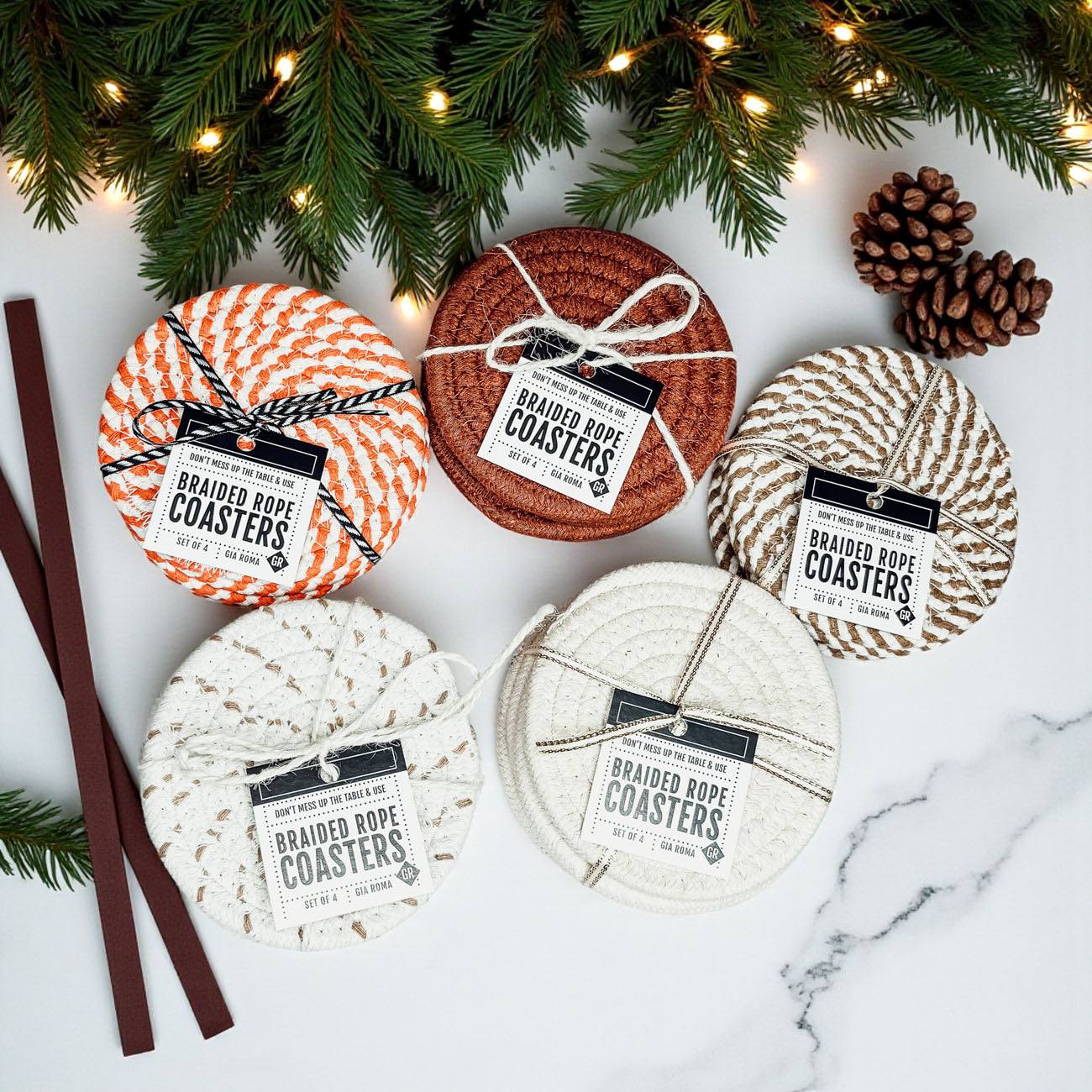 gift-ready coaster set for fall includes ribbon and branded tag
handcrafted coaster set with gift tag perfect for home decor lovers
cotton braided rope coasters handmade set with tag